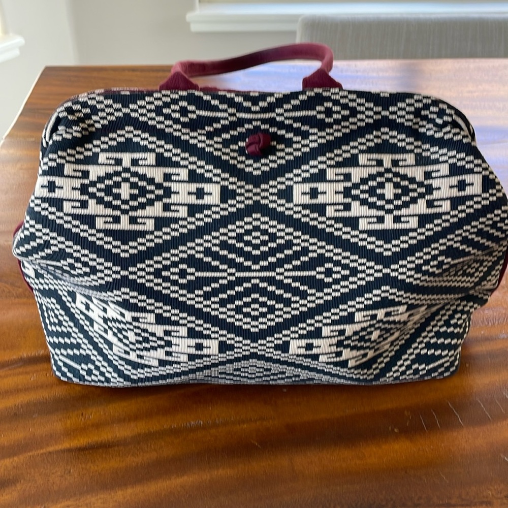 Beautiful Atenti fabric and suede purse. Wide, easy access opening.